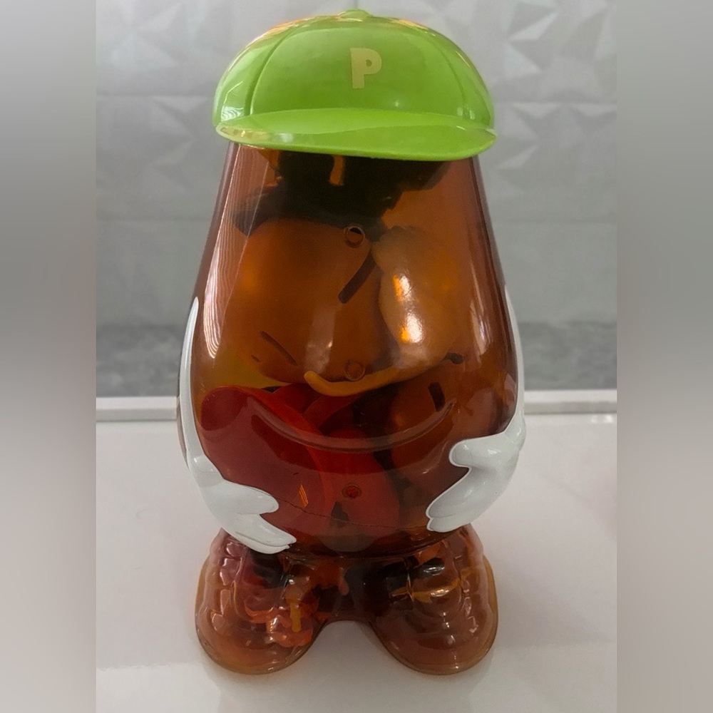 More the 40 pieces, Mr. Potato Head Clear Amber Body with Neon Green Hat